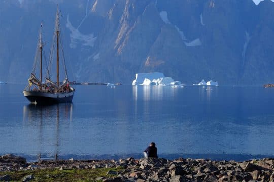 Guest ashore with Tecla anchored in East Greenland