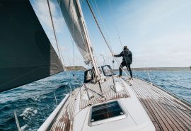 Guest on deck of Emma Claire sailing