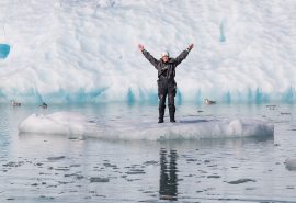 Guest on sheet of ice arctic Svalbard with Valiente