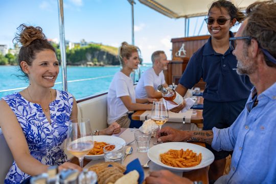 Guests eating lunch food on board Chronos