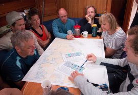 Guests navigation planning onboard Humla saloon interior