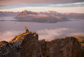 Humla guest hiking in the lofoten islands Norway top of mountain