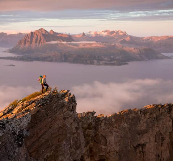 Humla guest hiking in the lofoten islands Norway top of mountain