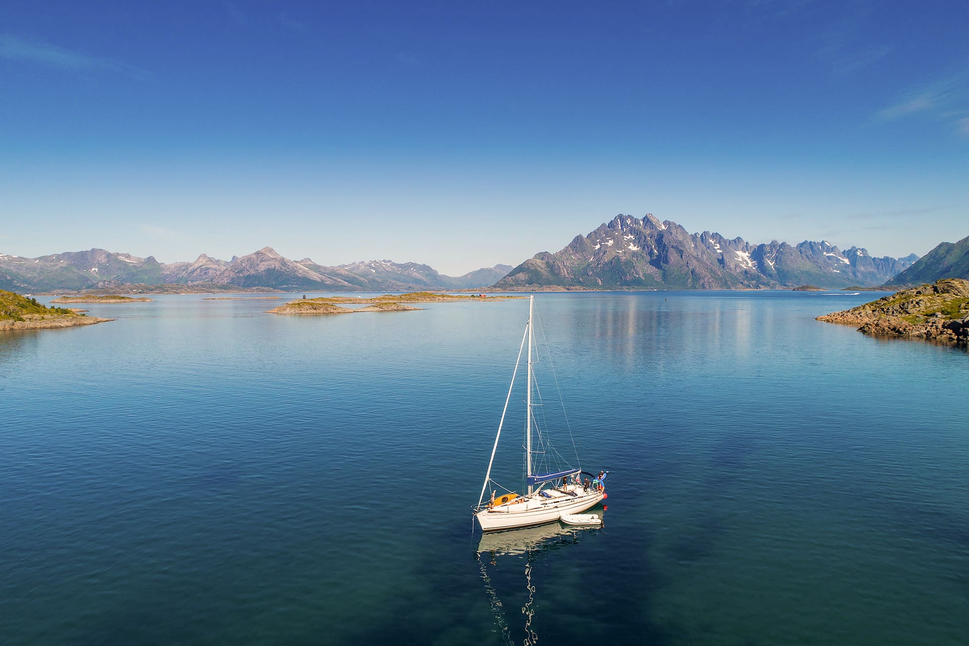 Humla yacht anchored in the Lofoten Islands, Norway on a sunny day
