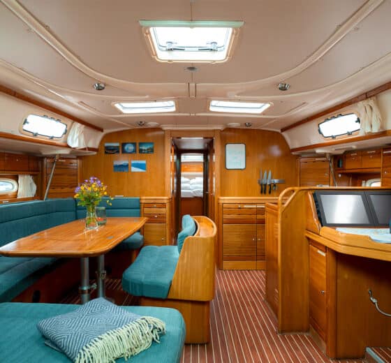 Humla yacht below deck view of interior onboard saloon and galley