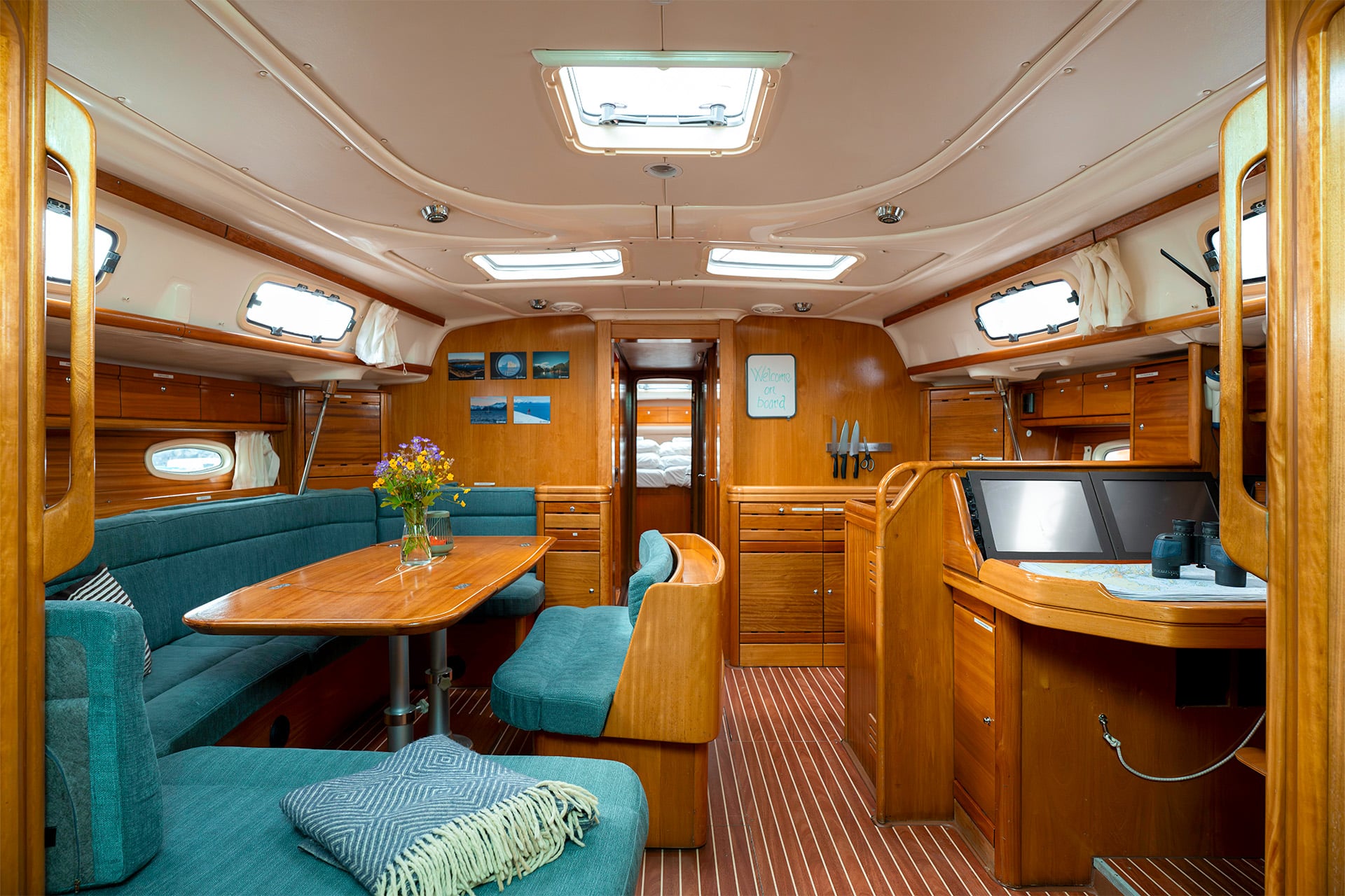 Humla yacht below deck view of interior onboard saloon and galley