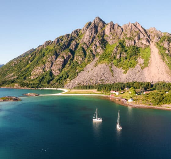 Humla yachts anchored in Lofoten islands Norway sailing in tandem
