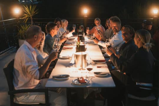 Ingrid More catamaran guests enjoying dinner local restaurant