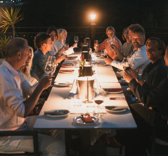 Ingrid More catamaran guests enjoying dinner local restaurant