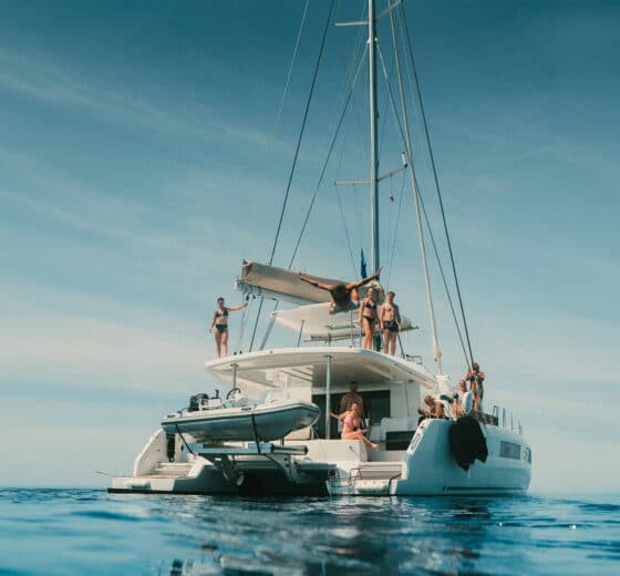 Ingrid More catamaran guests onboard anchored relaxing