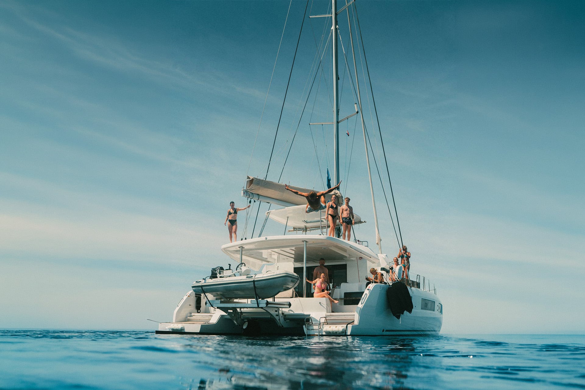 Ingrid More catamaran guests onboard anchored relaxing