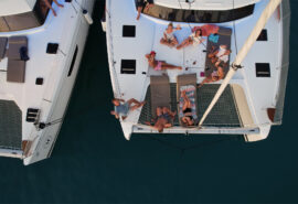 Ingrid More guests relaxing onboard catamaran