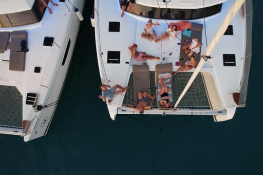 Ingrid More guests relaxing onboard catamaran