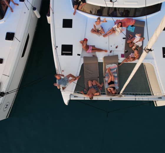 Ingrid More guests relaxing onboard catamaran