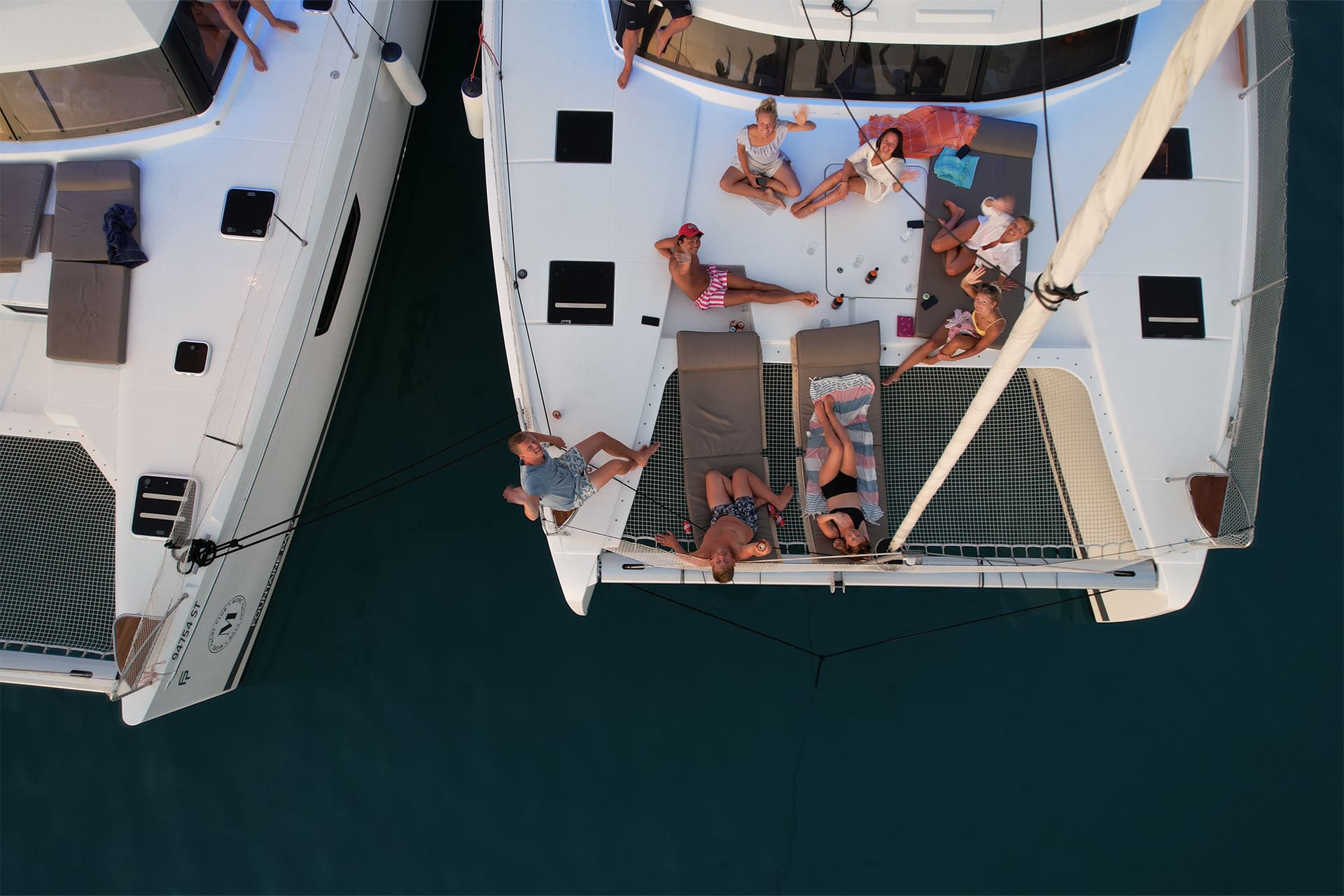 Ingrid More guests relaxing onboard catamaran