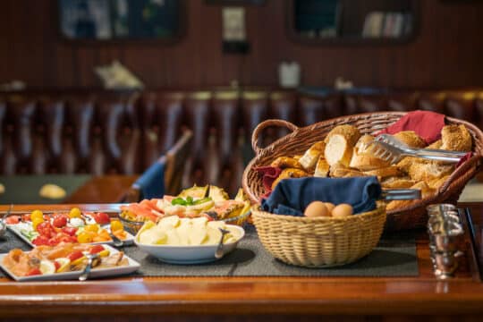 Kairos breakfast spread food dining onboard