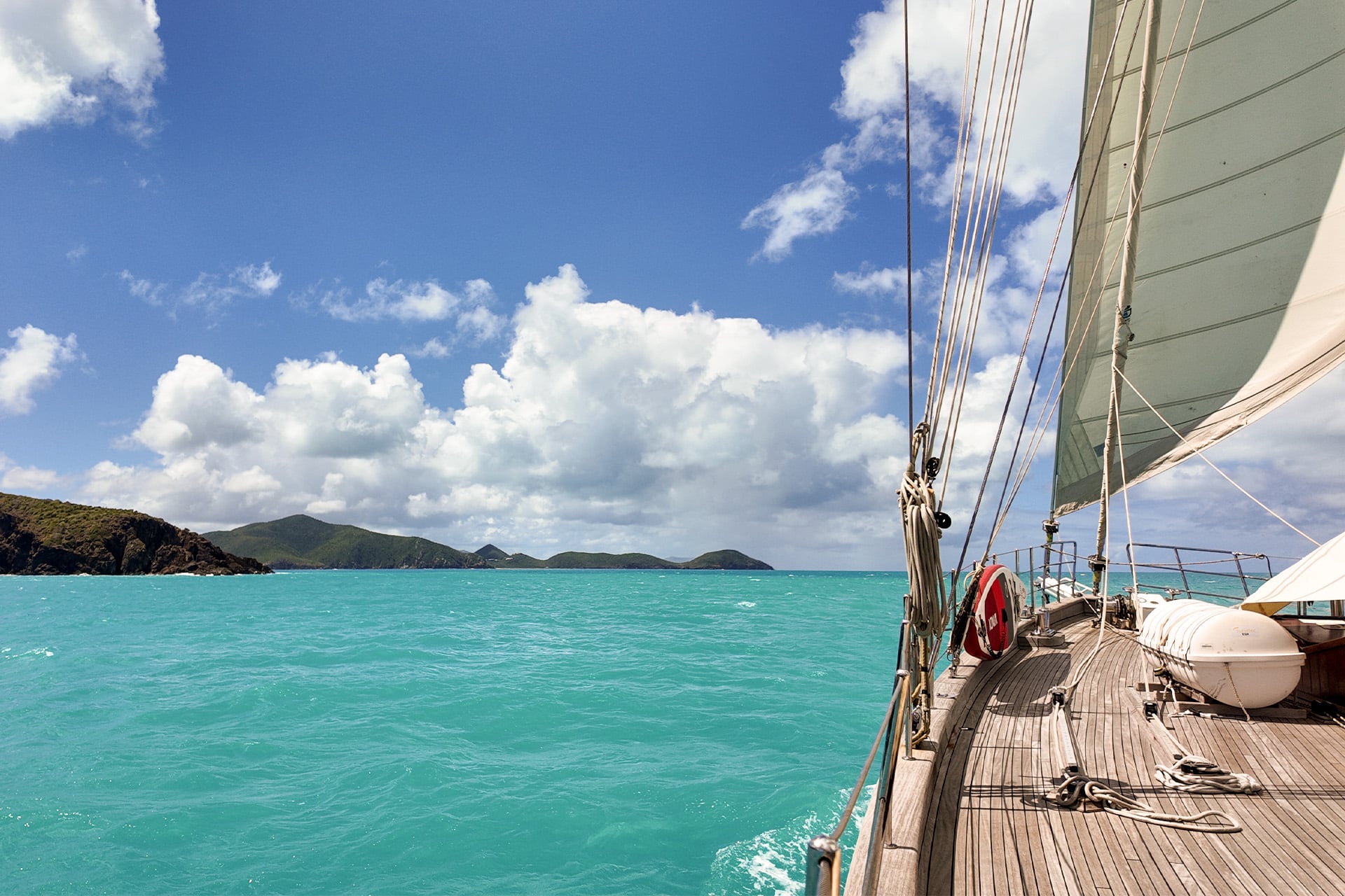 Kairos yacht underway on deck sailing in the BVIs British Virgin Islands