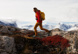 Linden guest hiking in the mountains of the Arctic Circle Greenland