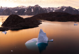 Linden tall ship anchored at dusk in Arctic Circle Greenland at sunset