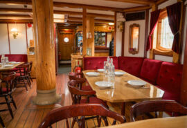 Linden tall ship below deck interior view of saloon onboard