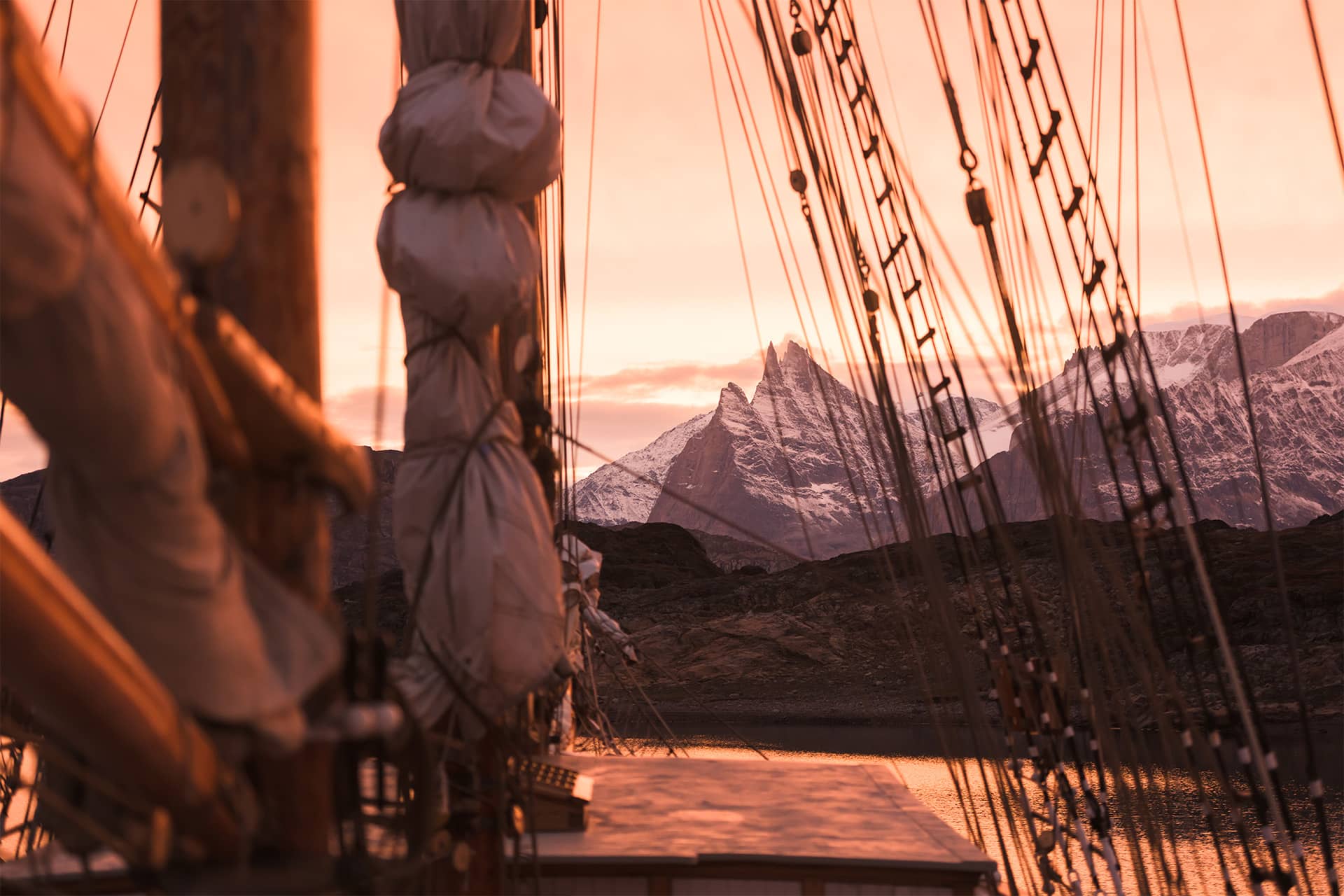Linden view of Arctic Greenland Mountains on deck at sunset