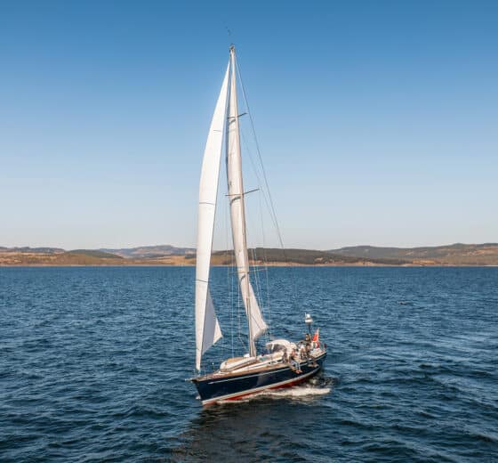 Noonmark VI Adventure yacht underway sailing off the Scottish Hebrides, Scotland