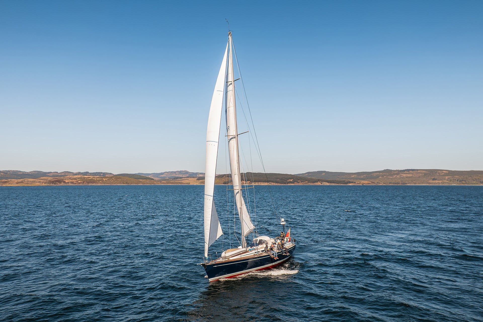 Noonmark VI Adventure yacht underway sailing off the Scottish Hebrides, Scotland