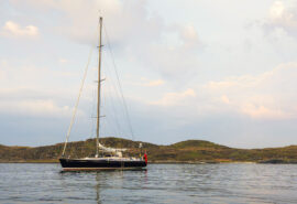 Noonmark VI adventure yacht anchored off the coast of the Hebrides, Scotland
