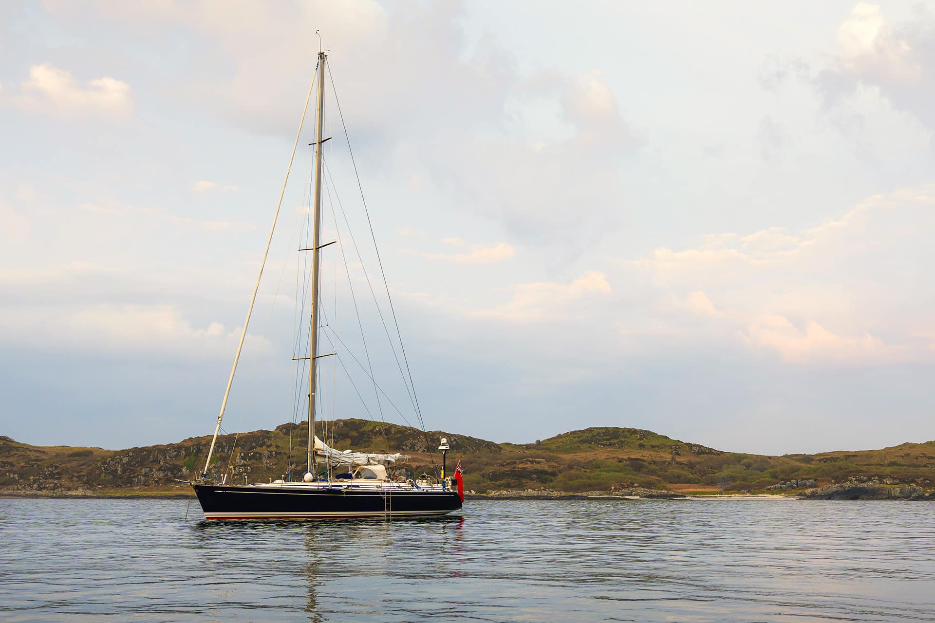 Noonmark VI adventure yacht anchored off the coast of the Hebrides, Scotland