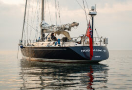 Noonmark VI adventure yacht seen from stern at anchor in Scotland