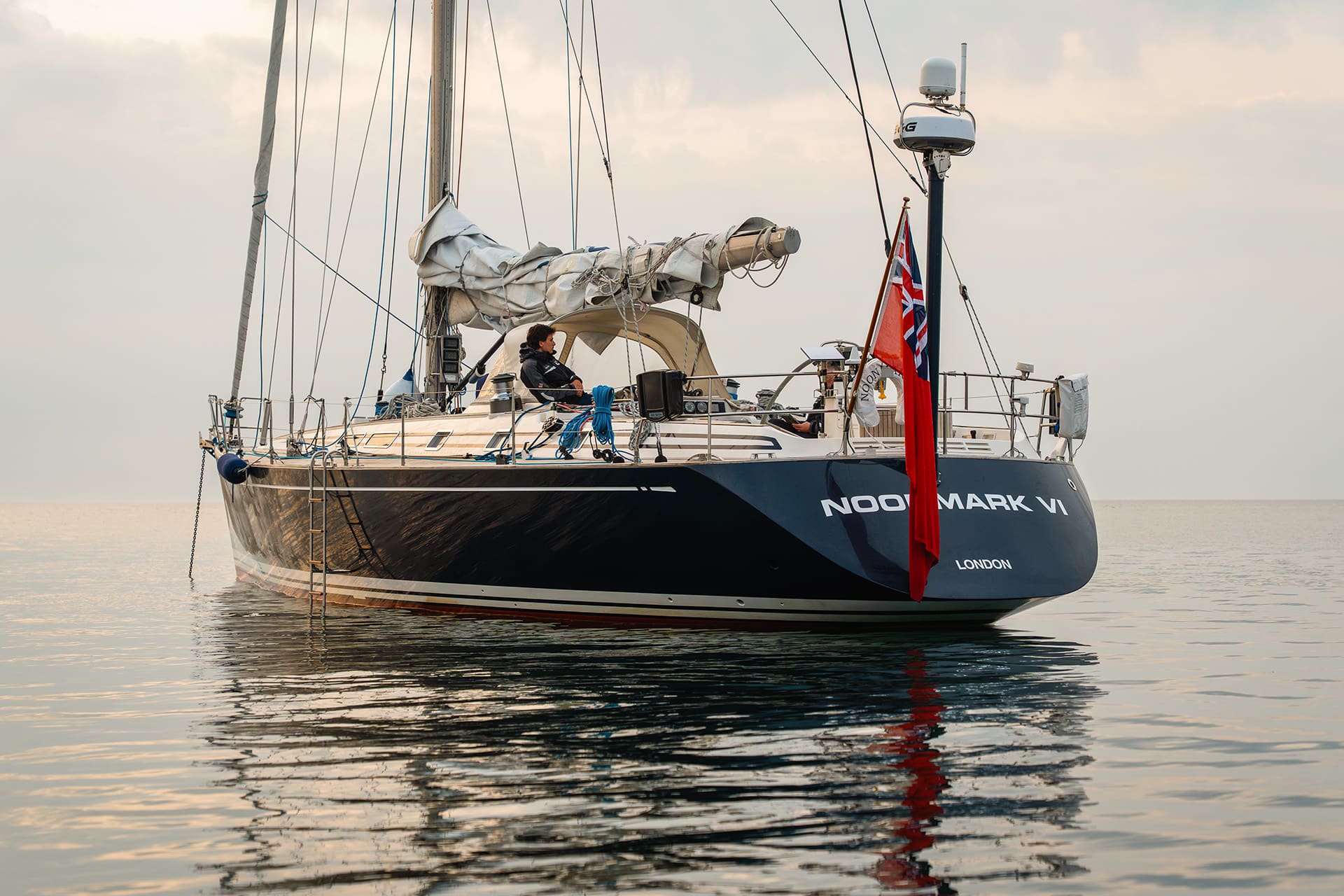 Noonmark VI adventure yacht seen from stern at anchor in Scotland