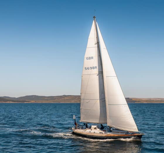 Noonmark VI yacht underway full sail Hebrides, Scotland
