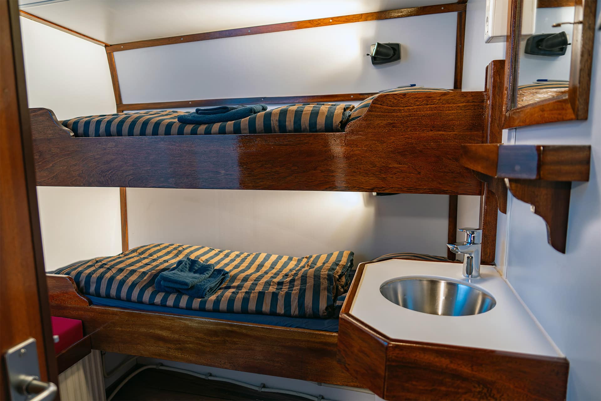 Noorderlicht onboard interior view of twin bunk cabin