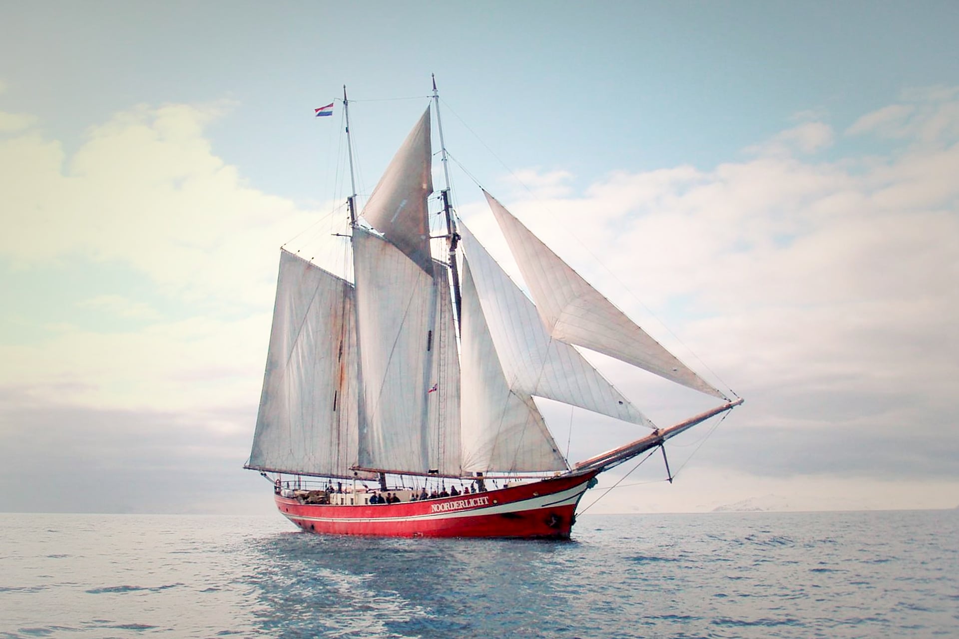Noorderlicht tall ship underway full sail sunny sky