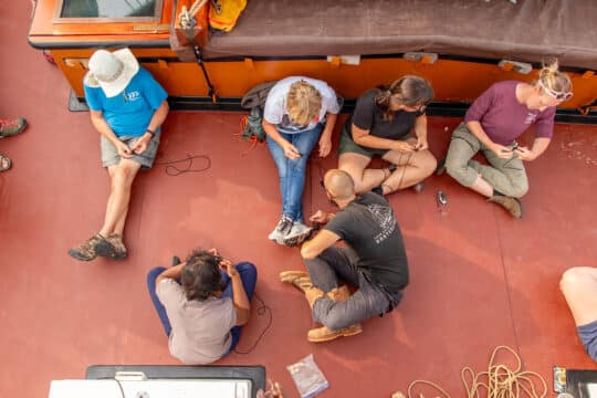 Ooosterschelde guests on deck learning knots crew
