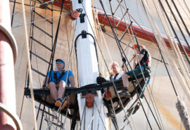 Oosterschelde guests onboard climbing rigging on deck