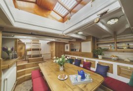 Pellew wooden pilot cutter boat table and seating