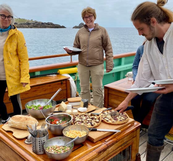 Pellew guests eating lunch ondeck