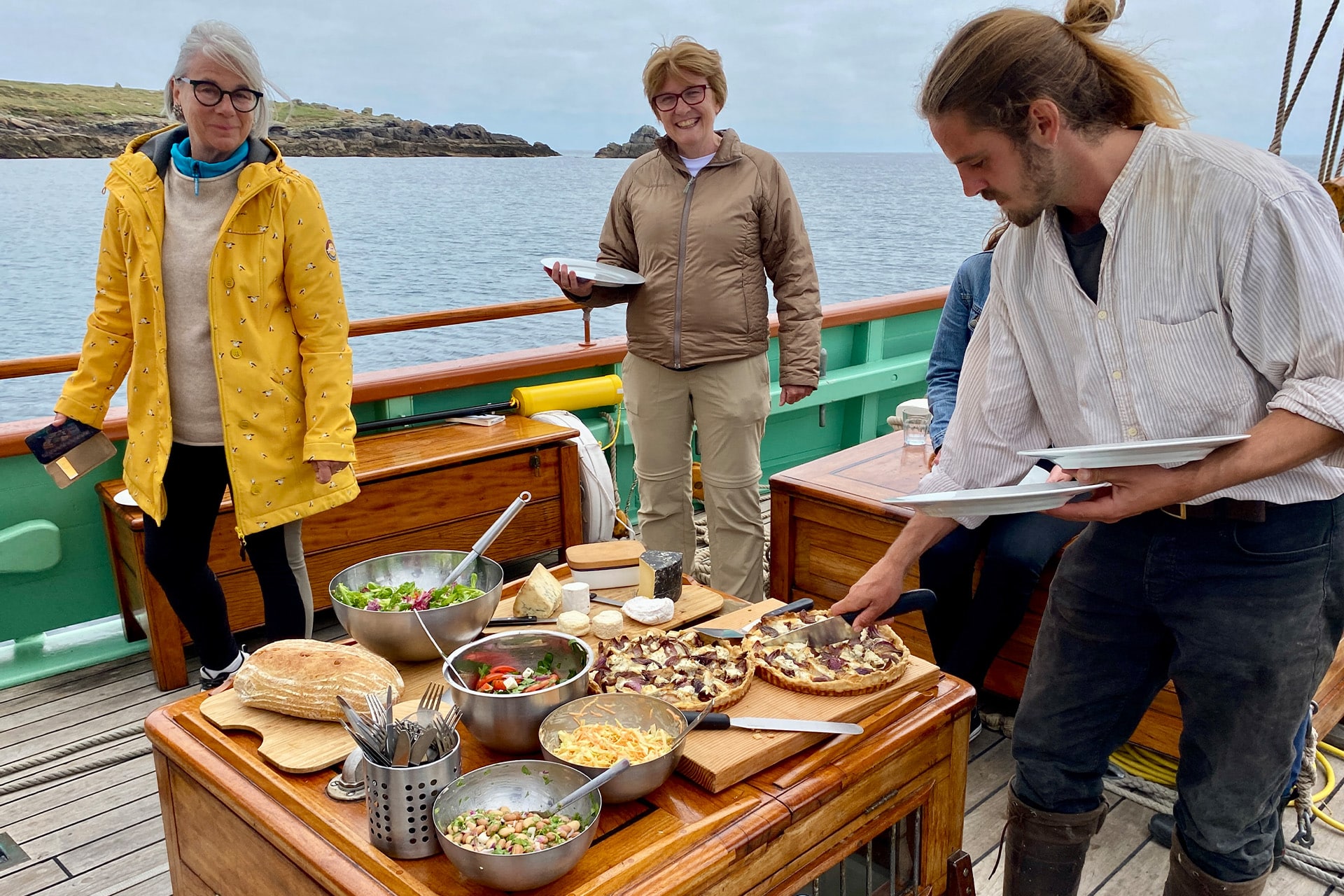 Pellew guests eating lunch ondeck