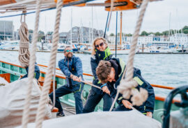 Pellew guests pulling ropes onboard