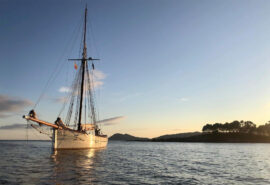 Pellew pilot cutter anchored in sunshine Europe France