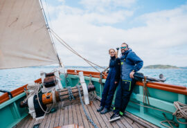 Pellew pilot cutter guests on bowsprit
