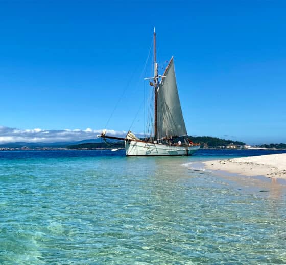 Pellew pilot cutter on beach sunny Isles of Scilly France