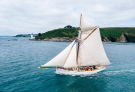 Pellew pilot cutter sailing along Cornish coastline