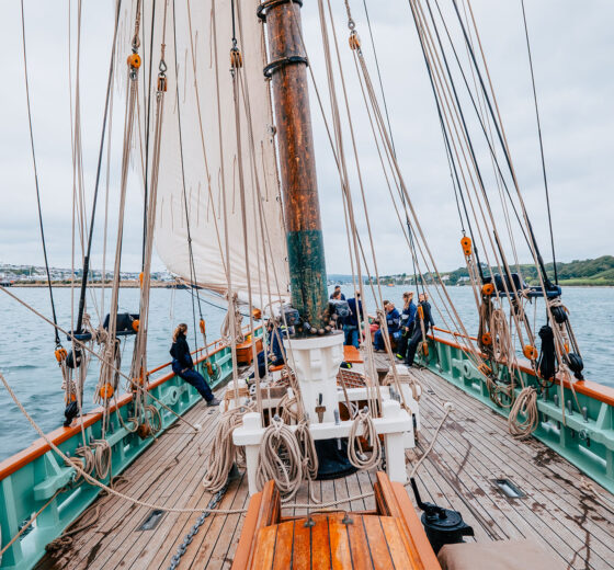 Pellew pilot cutter sailing on deck Cornwall