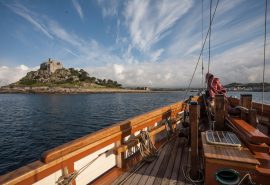 Pilgrim of Brixham sailing by St. Michael's Mount, Cornwall - Sailing Holidays in Devon and Cornwall