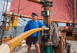 Using the tiller on Pilgrim of Brixham - Ian Kippax