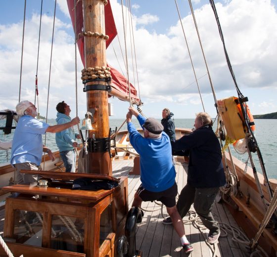 Hoisting sails on Pilgrim of Brixham - Ian Kippax