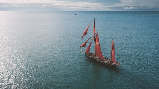 Pilgrim-aerial-fullsail-sea