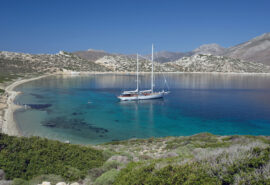Rhea classic yacht anchored in the Cyclades, Greece, Mediterranean
